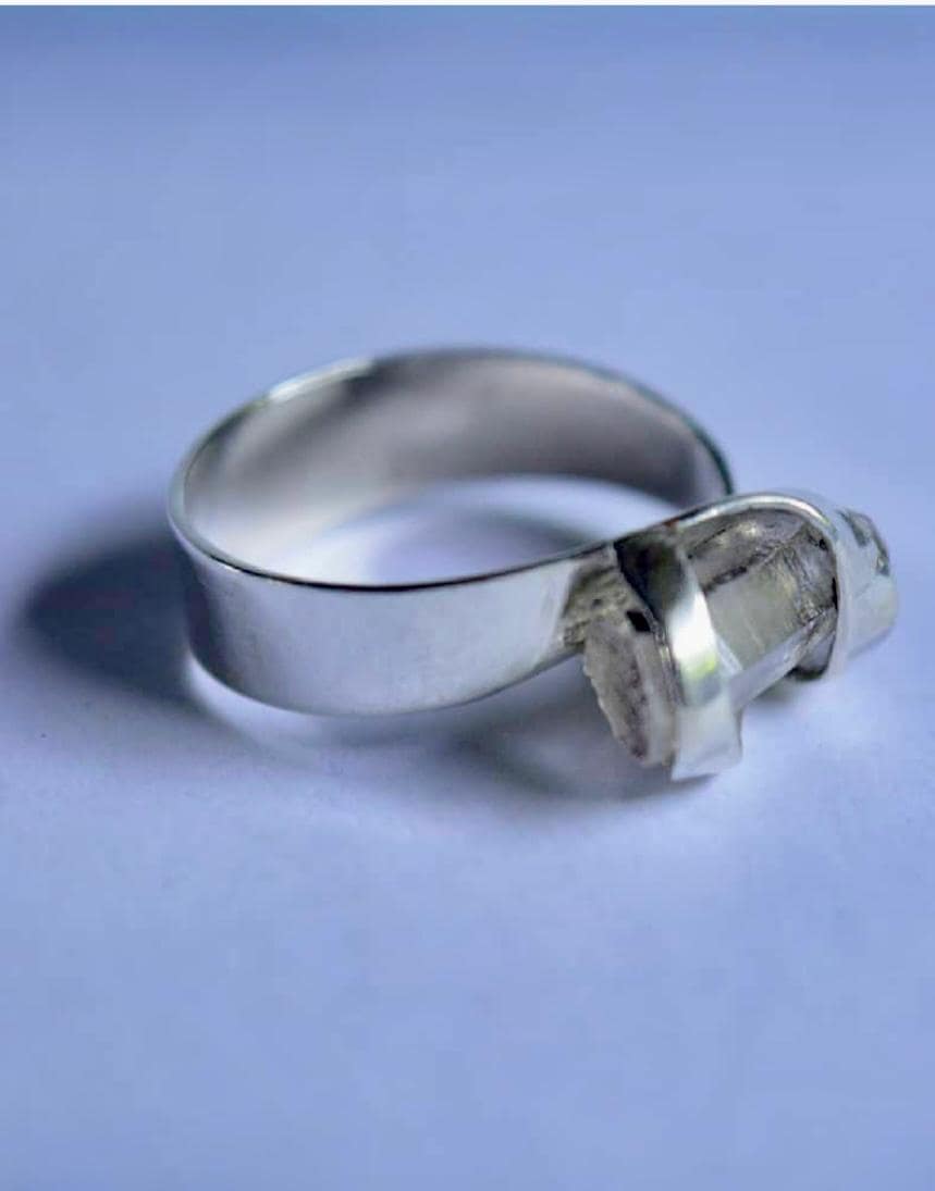 Silver ring with round quartz crystal