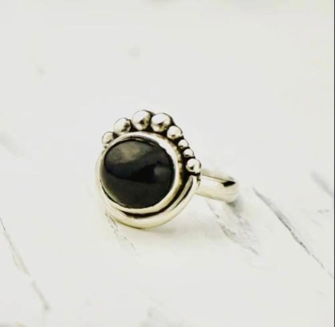 Sterling silver with black stone