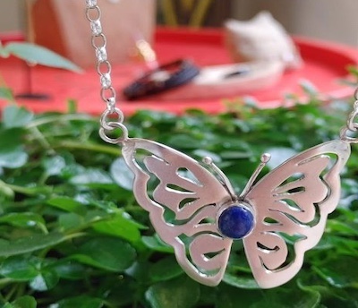 Necklace with silver and blue stone